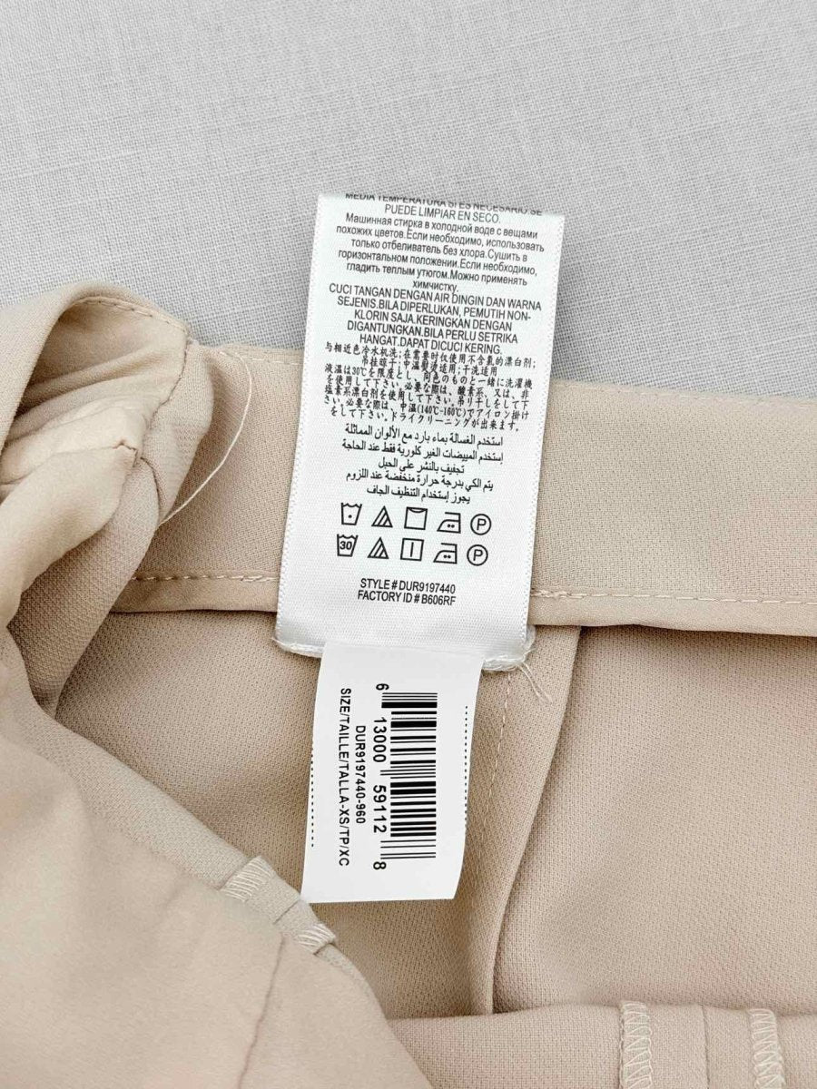 Pre-loved BCBG MAXAZRIA Beige Size XSmall Jumpsuit at Reems Closet