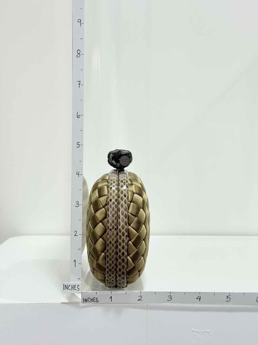 Pre - loved BOTTEGA VENETA Knot Gold Intrecciato Clutch at Reems Closet