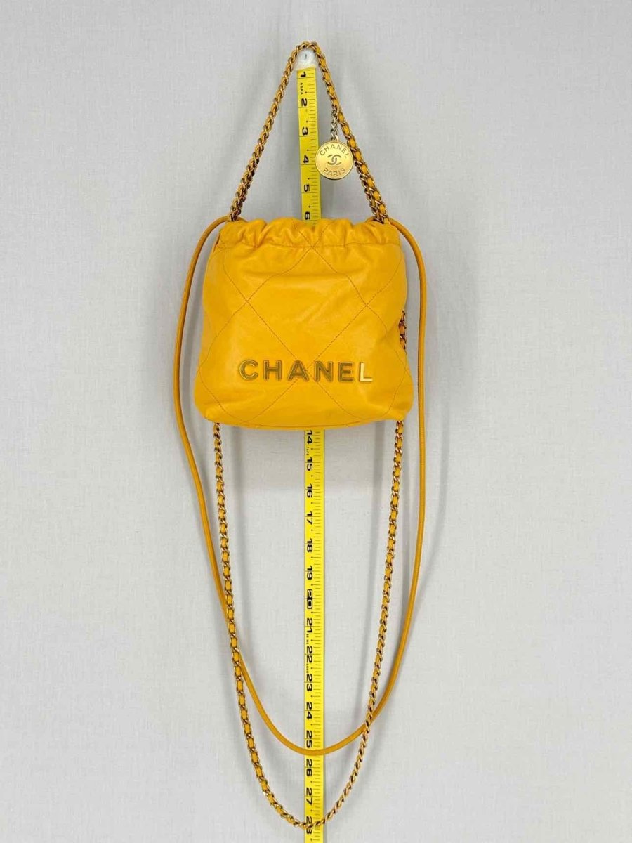 Pre - loved CHANEL 22 Mustard Quilted Crossbody at Reems Closet