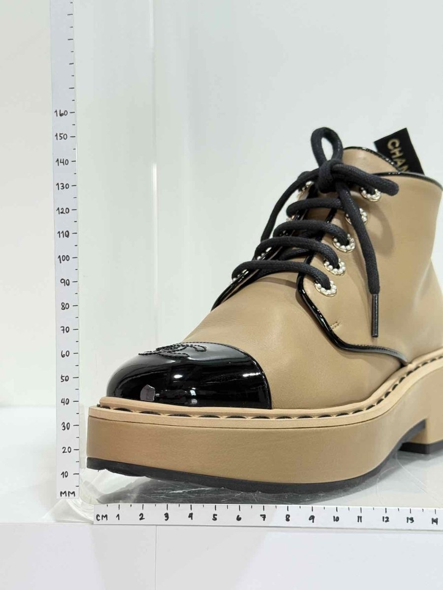 Pre - loved CHANEL Beige & Black Size EU 39 Boots at Reems Closet