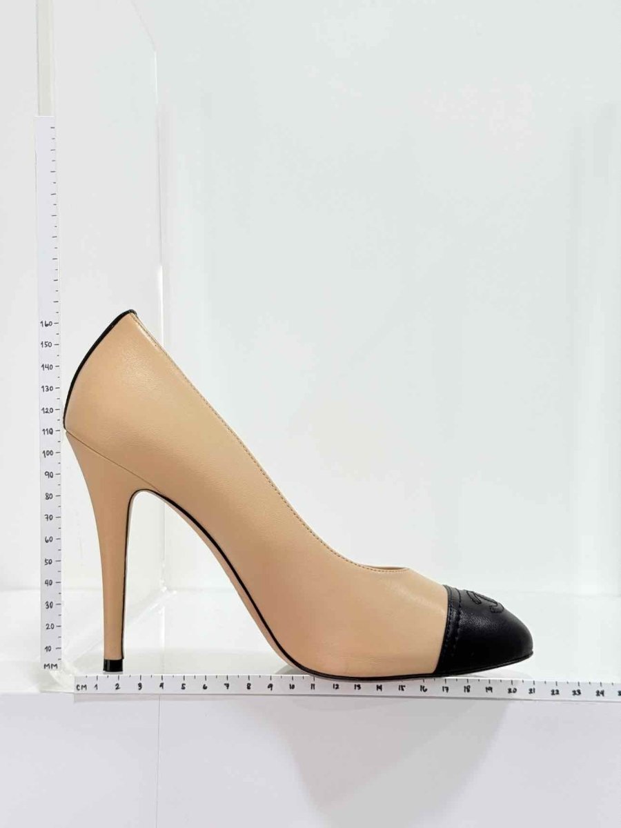 Pre - loved CHANEL Beige w/ Black CC Cap Toe Size EU 38 Pumps at Reems Closet
