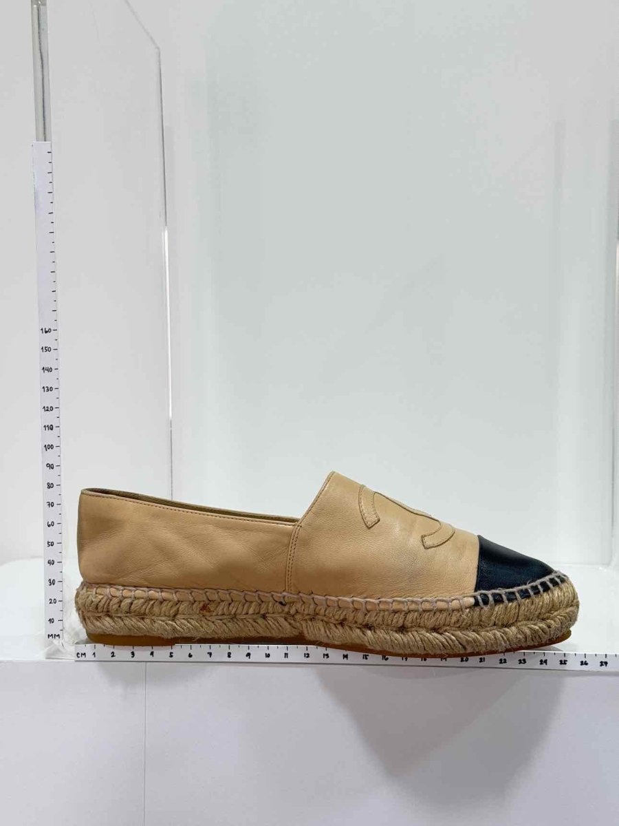 Pre - loved CHANEL Escapade Beige w/ Black Size EU 38 Flat Shoes at Reems Closet
