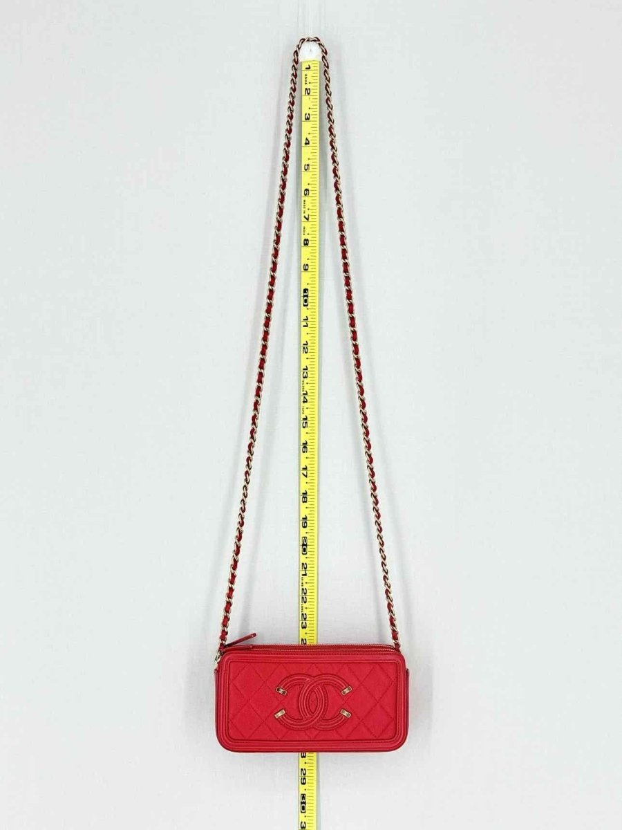 Pre - loved CHANEL Filigree Red Quilted Clutch at Reems Closet