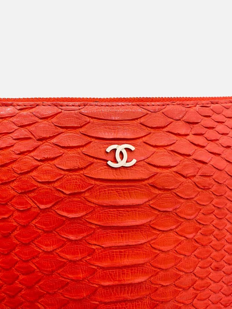 Pre-loved CHANEL O Case Red Clutch from Reems Closet