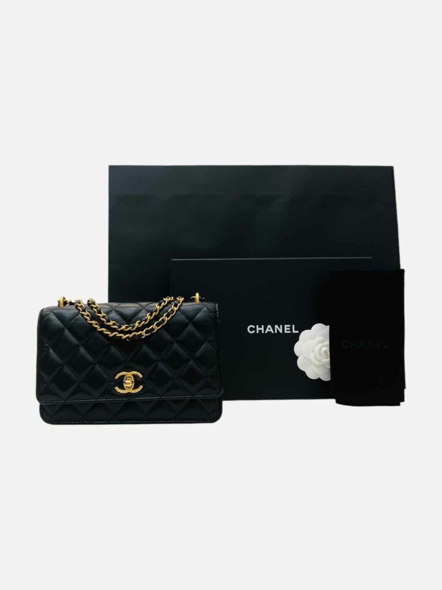 Pre - loved CHANEL Wallet on Chain Black Quilted Shoulder Bag at Reems Closet