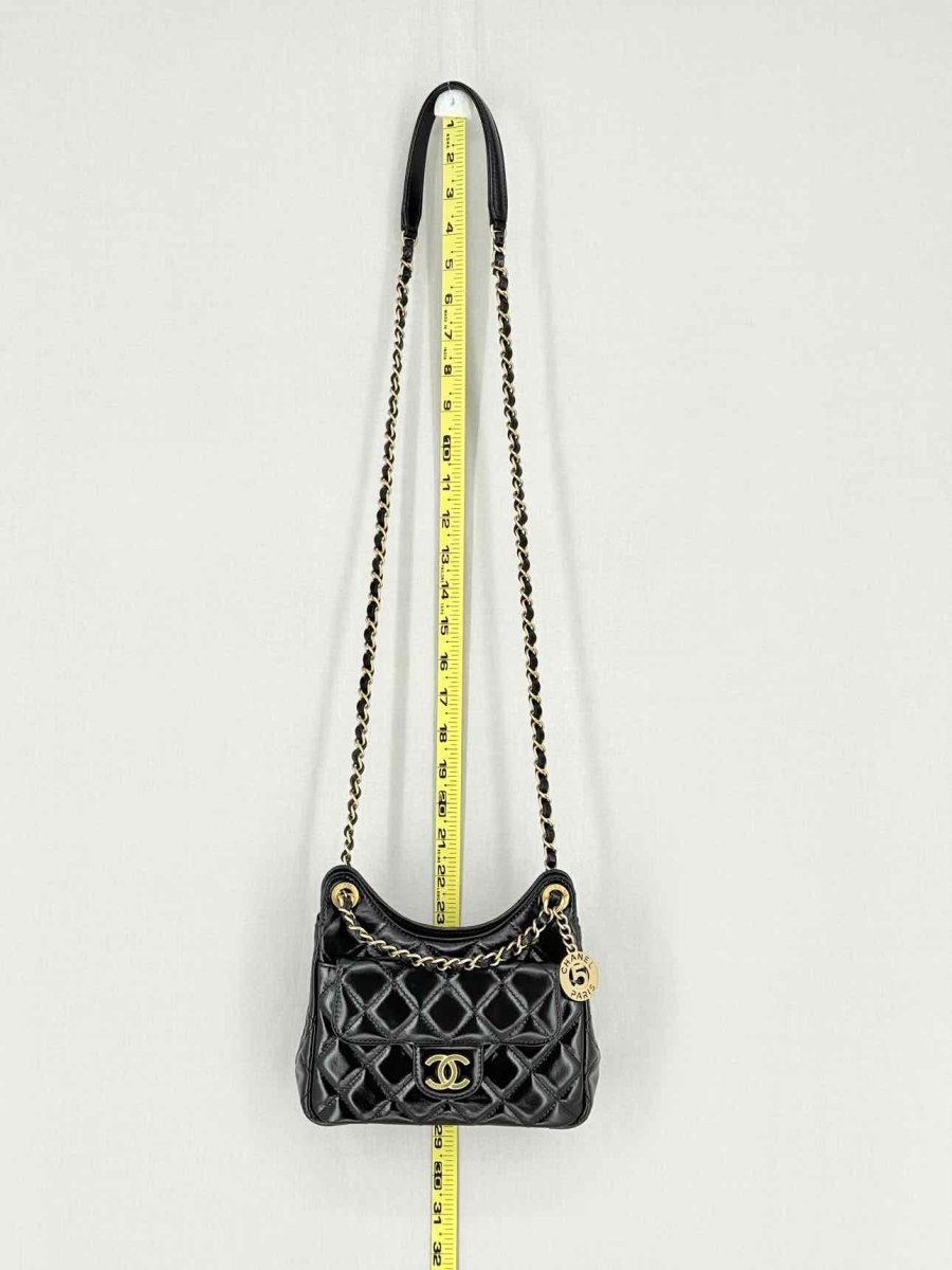 Pre - loved CHANEL Wavy CC Hobo Black Quilted Shoulder Bag at Reems Closet