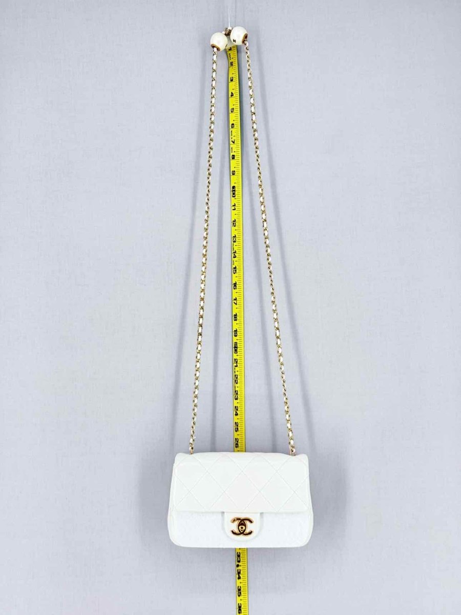 Pre - loved CHANEL White Quilted Crossbody at Reems Closet