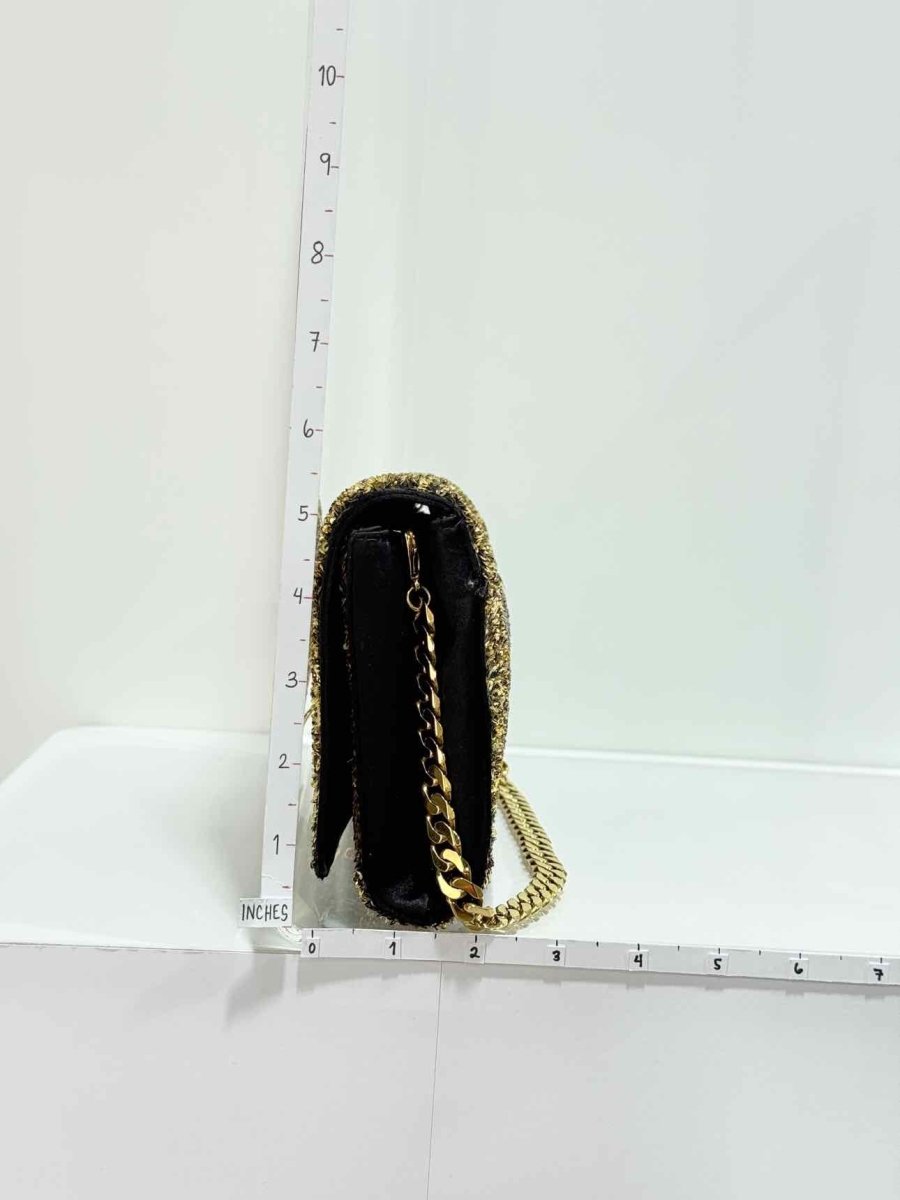 Pre-loved CHRISTIAN LOUBOUTIN Catalina Gold & Brown Clutch at Reems Closet