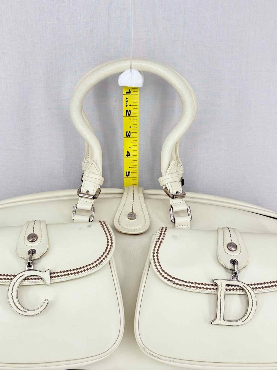 Pre-loved DIOR Vintage Off-white Top Handle at Reems Closet