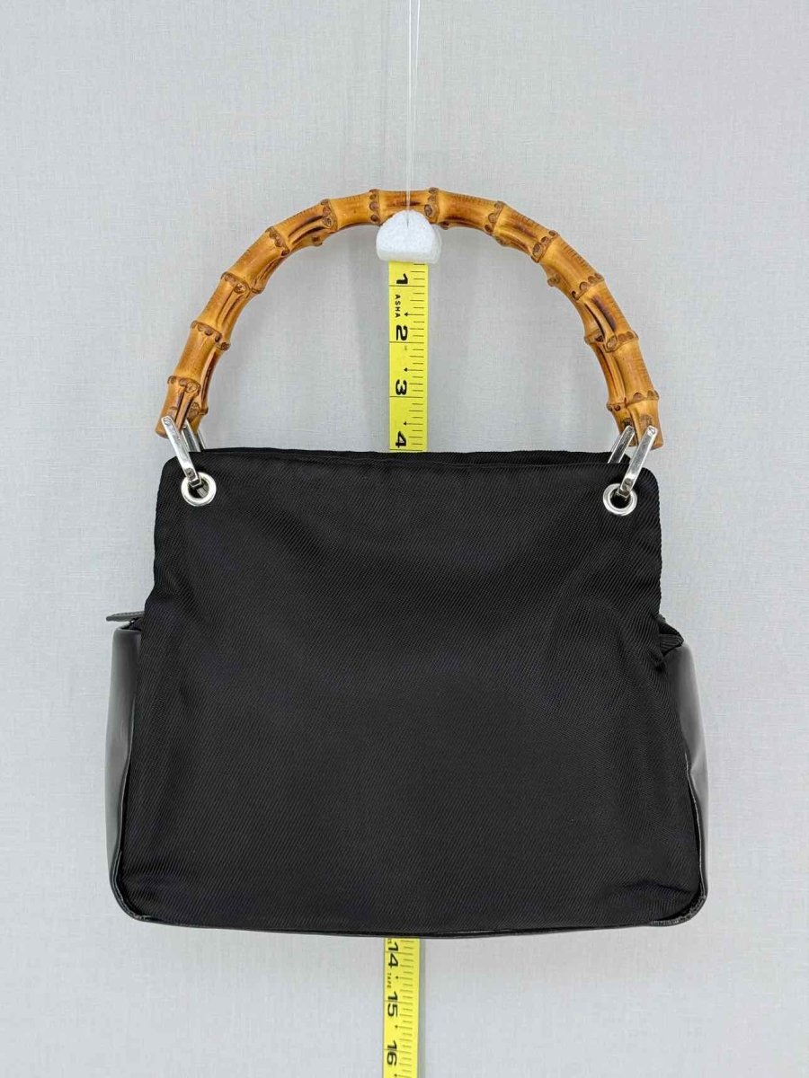 Pre-loved GUCCI Bamboo Black Top Handle at Reems Closet
