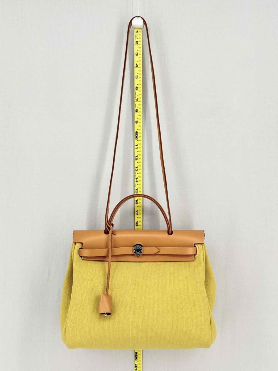 Pre - loved HERMES Herbag Zip Yellow Top Handle at Reems Closet