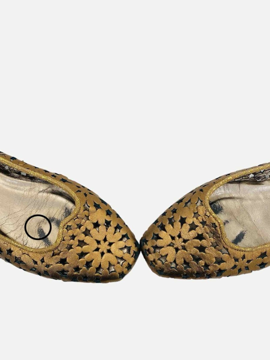 Pre-loved JIMMY CHOO Momo Gold Laser-cut Flats from Reems Closet
