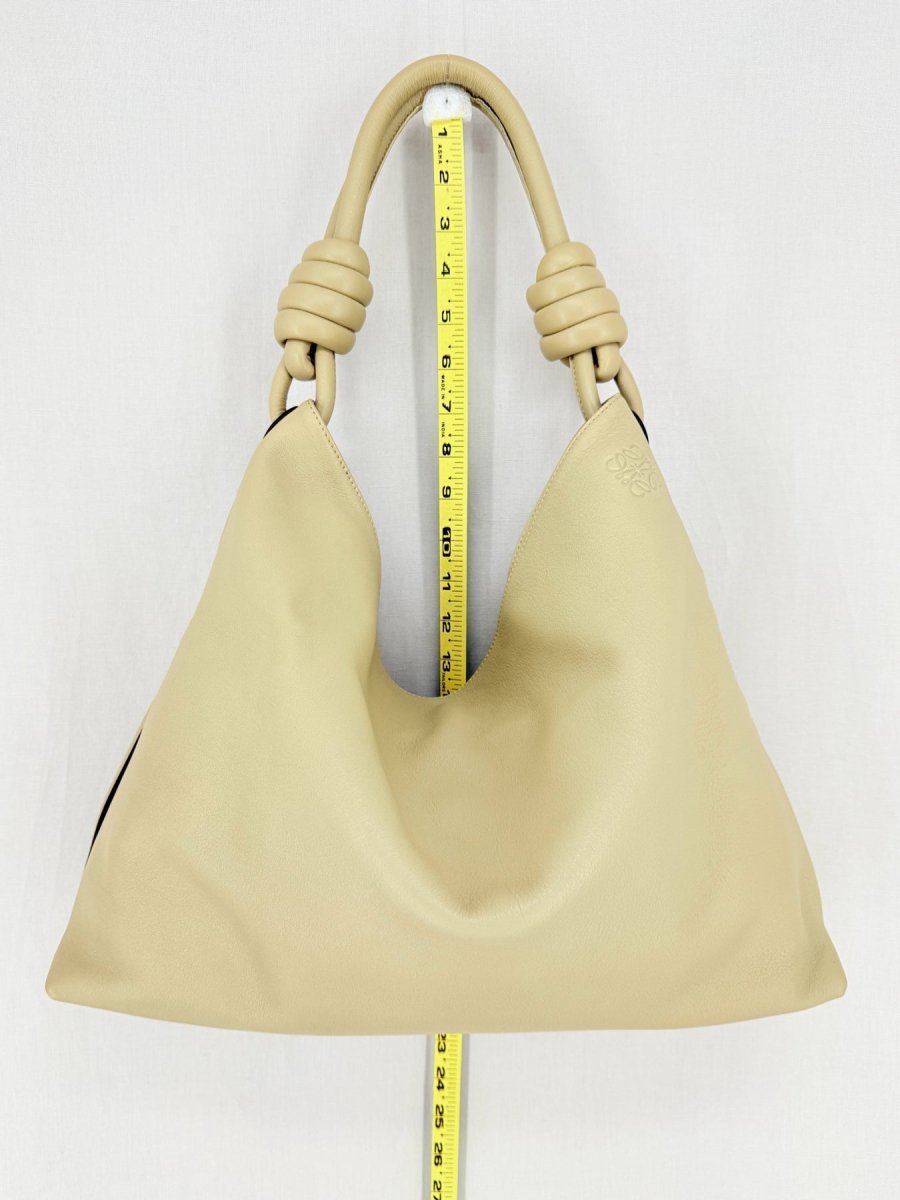 Pre - loved LOEWE Flamenco Knot Cream Hobo bag at Reems Closet