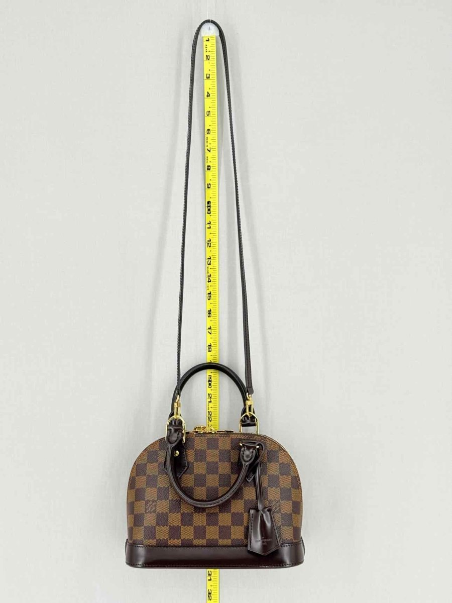 Pre - loved LOUIS VUITTON Alma Brown Damier Ebene Top Handle at Reems Closet