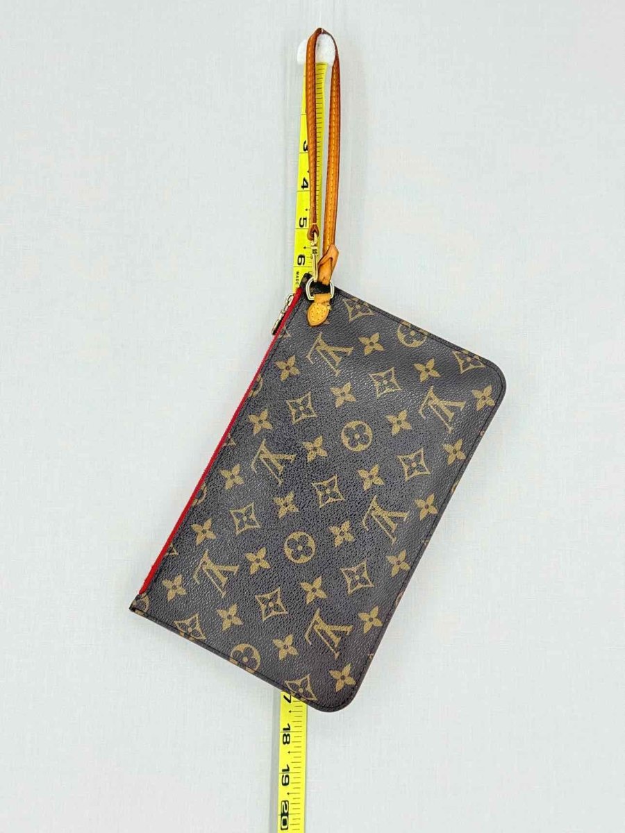 Pre - loved LOUIS VUITTON Brown Monogram Pouch at Reems Closet