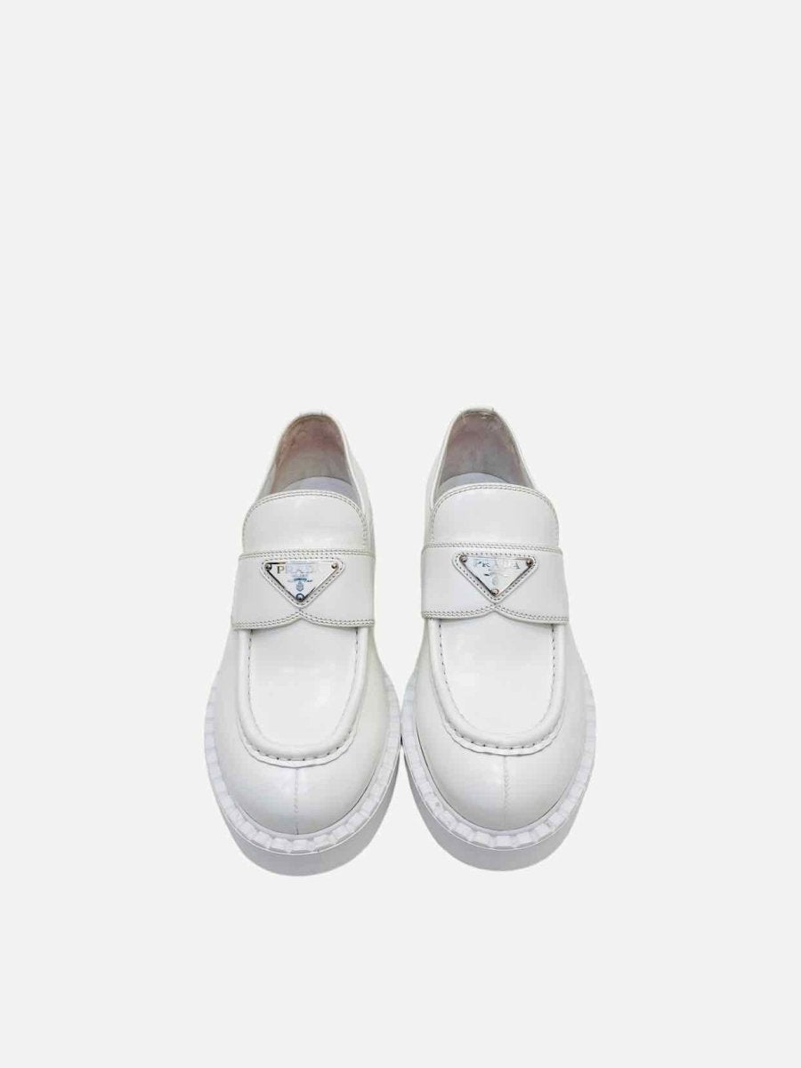Pre-loved PRADA Slip On White Loafers from Reems Closet