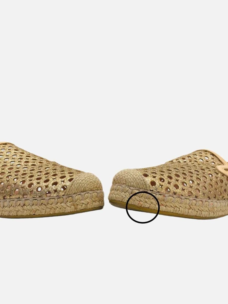 Pre-loved STUART WEITZMAN Espadrille Gold Perforated Flats from Reems Closet