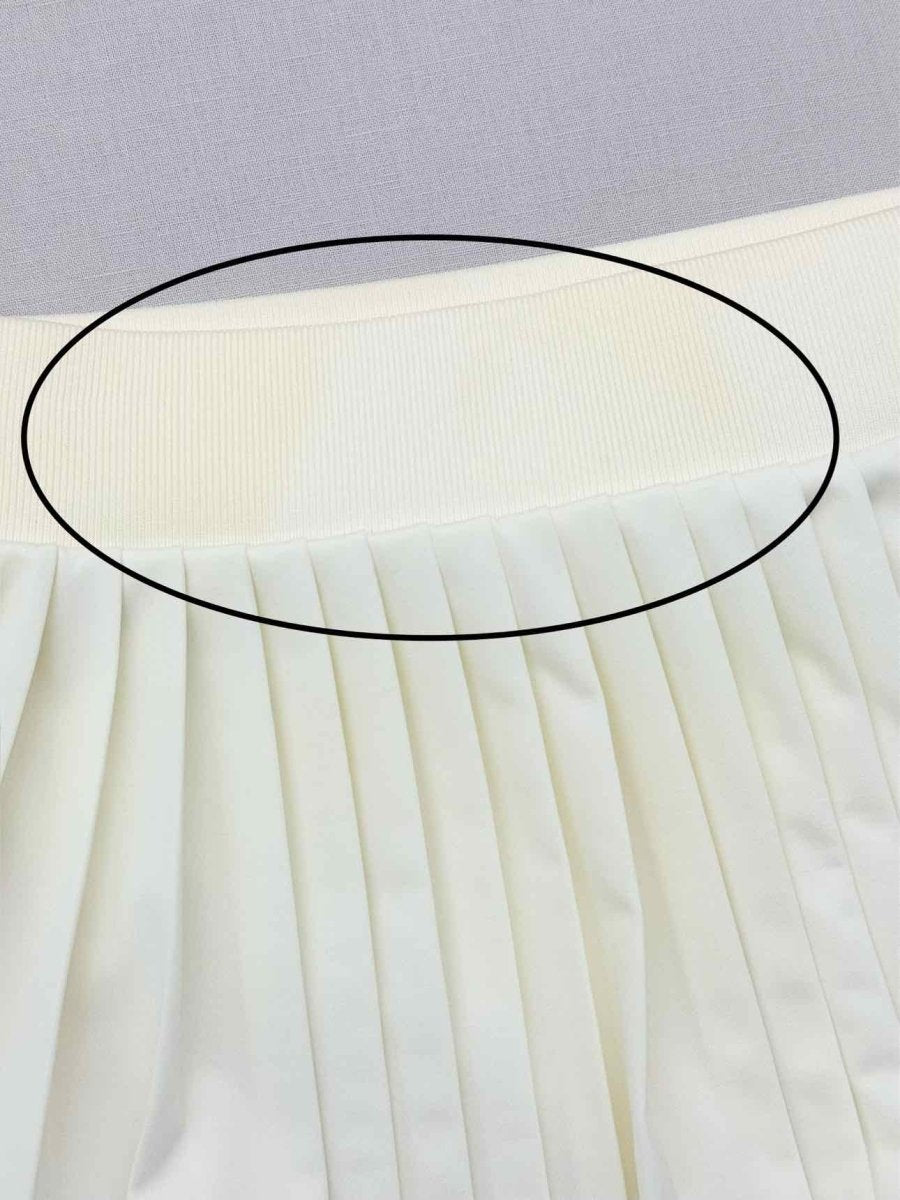 Pre-loved TORY BURCH Cream Size Medium Mini Skirt at Reems Closet