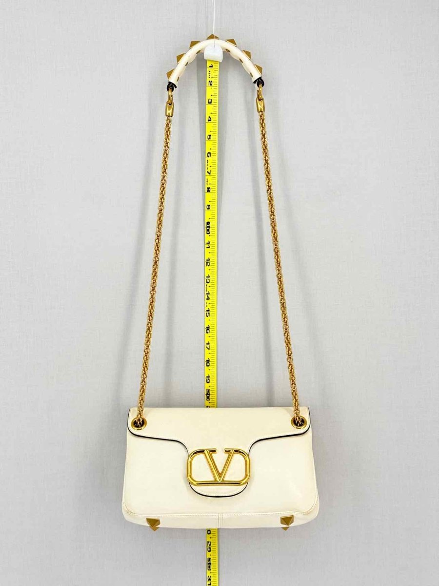 Pre-loved VALENTINO GARAVANI Stud Sign Cream Shoulder Bag at Reems Closet