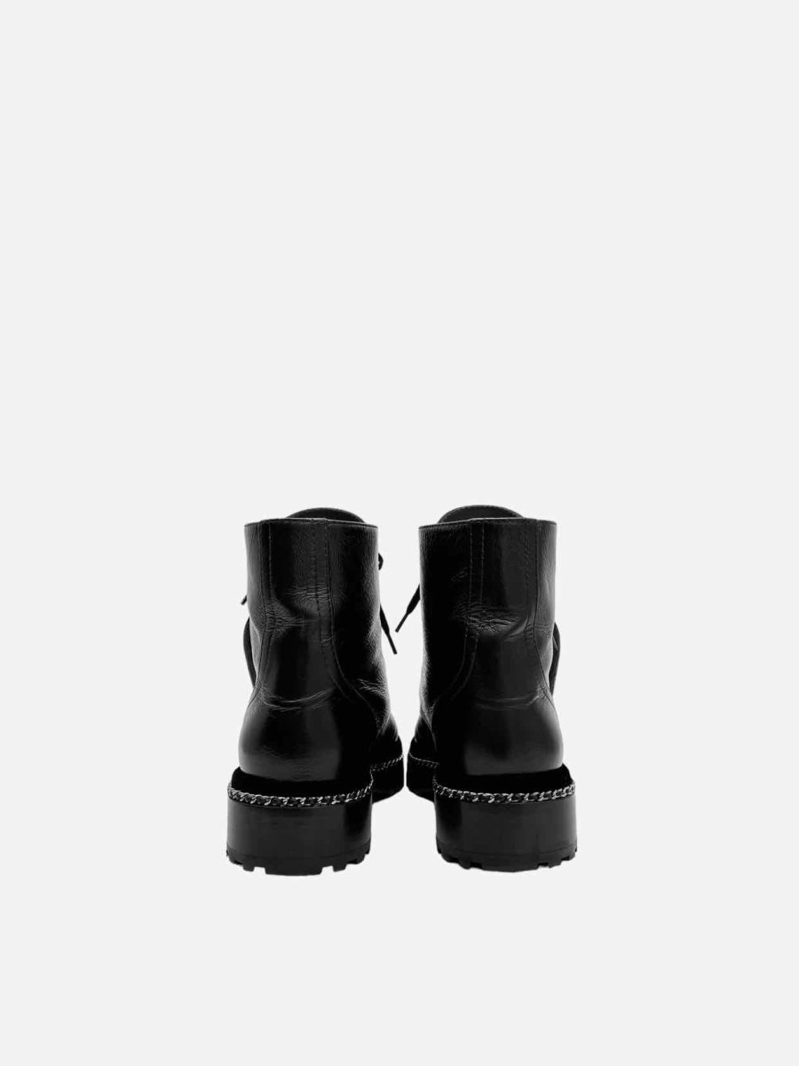 Pre-loved CHANEL Combat Black Quilted Ankle Boots from Reems Closet