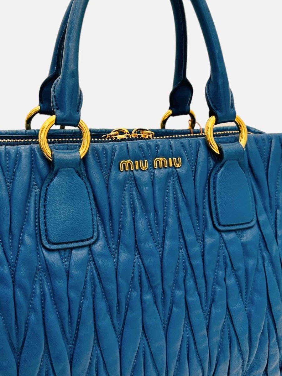Pre-loved MIU MIU Matelasse Blue Top Handle from Reems Closet