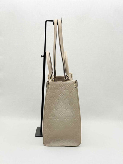 LOUIS VUITTON Onthego Cream Monogram Empriente Tote Bag