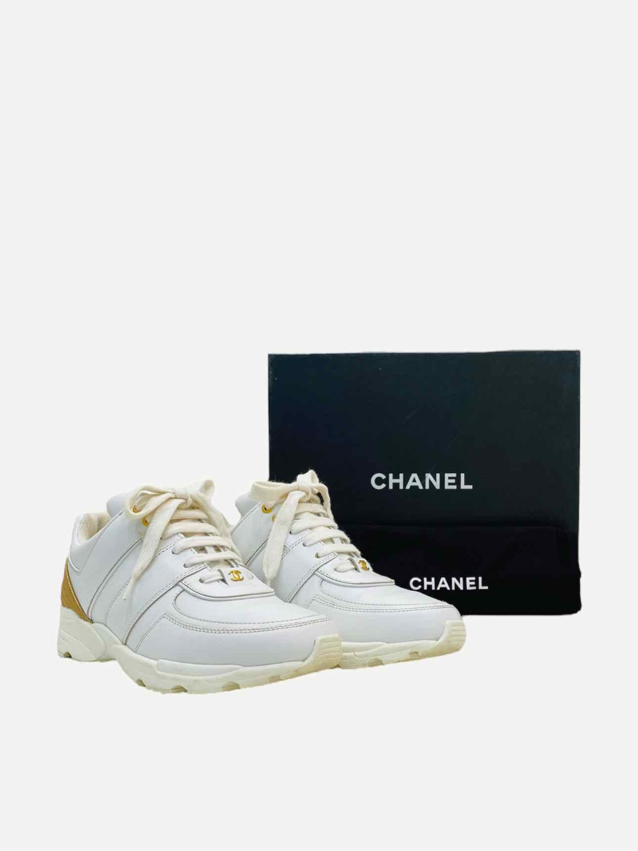 CHANEL White w/ Gold Size EU 37.5 Sneakers