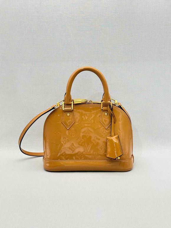 LOUIS VUITTON Alma Tan Monogram Top Handle