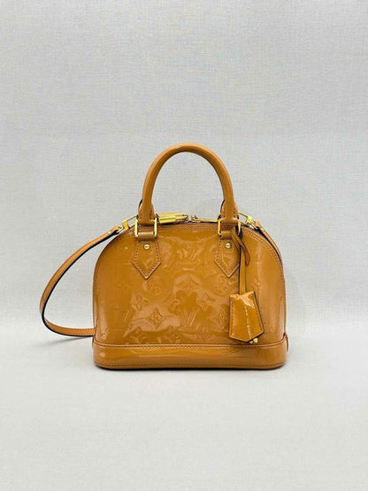 LOUIS VUITTON Alma Tan Monogram Top Handle