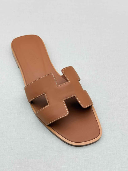 HERMES ORAN Gold Size EU 37.5 Sandals