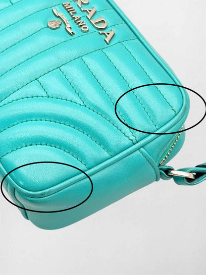 PRADA Diagramme Camera Turquoise Quilted Crossbody