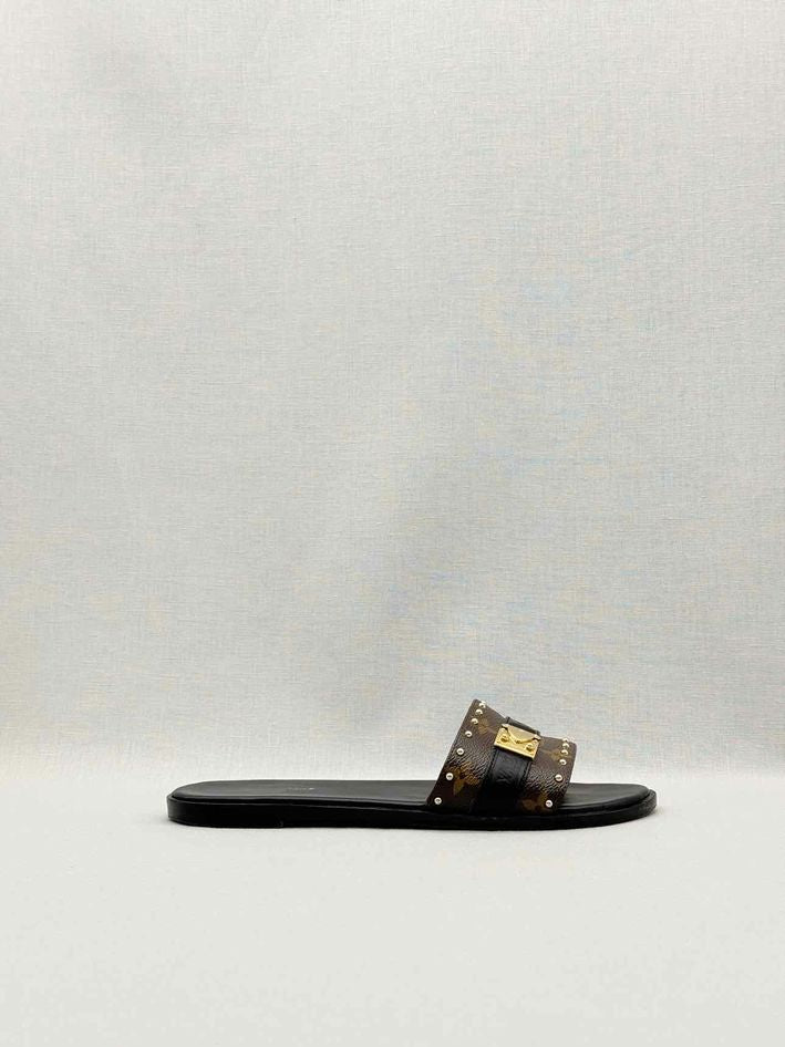 LOUIS VUITTON LOCK IT Brown & Black Size EU 37.5 Slides