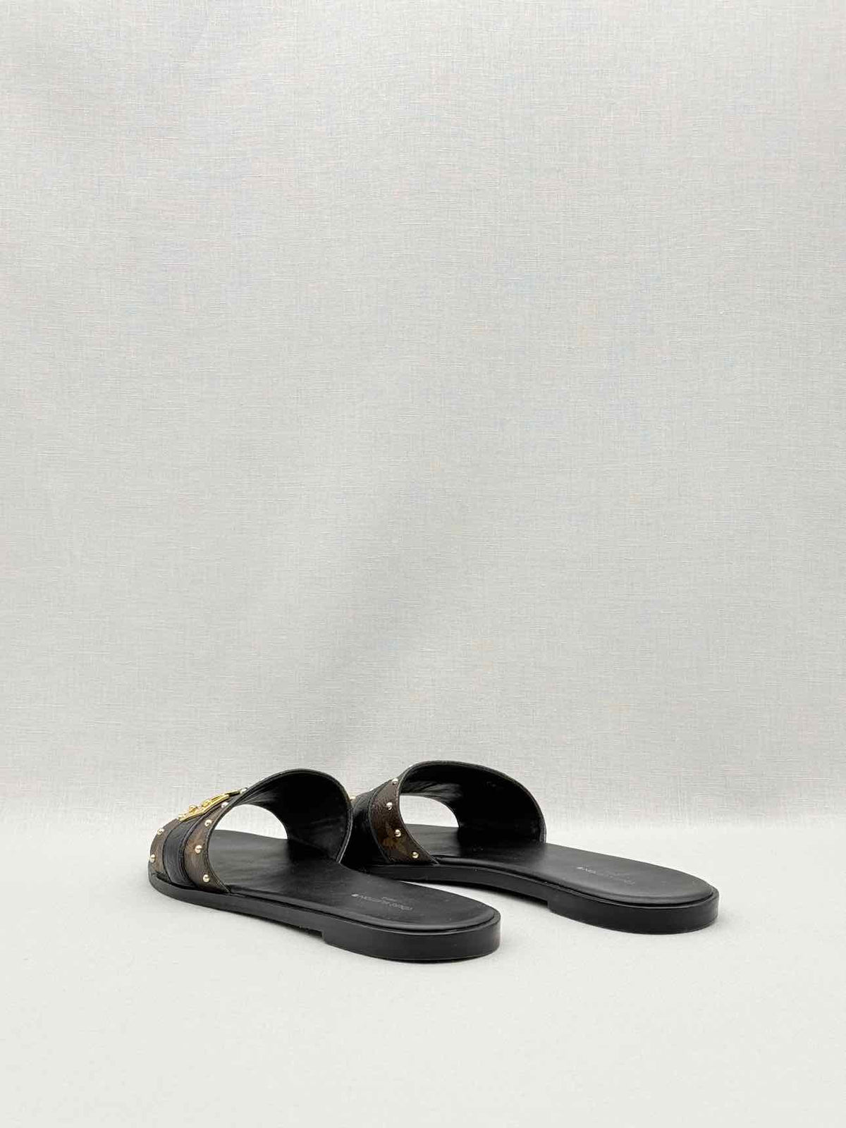 LOUIS VUITTON LOCK IT Brown & Black Size EU 37.5 Slides