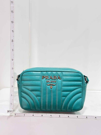 PRADA Diagramme Camera Turquoise Quilted Crossbody