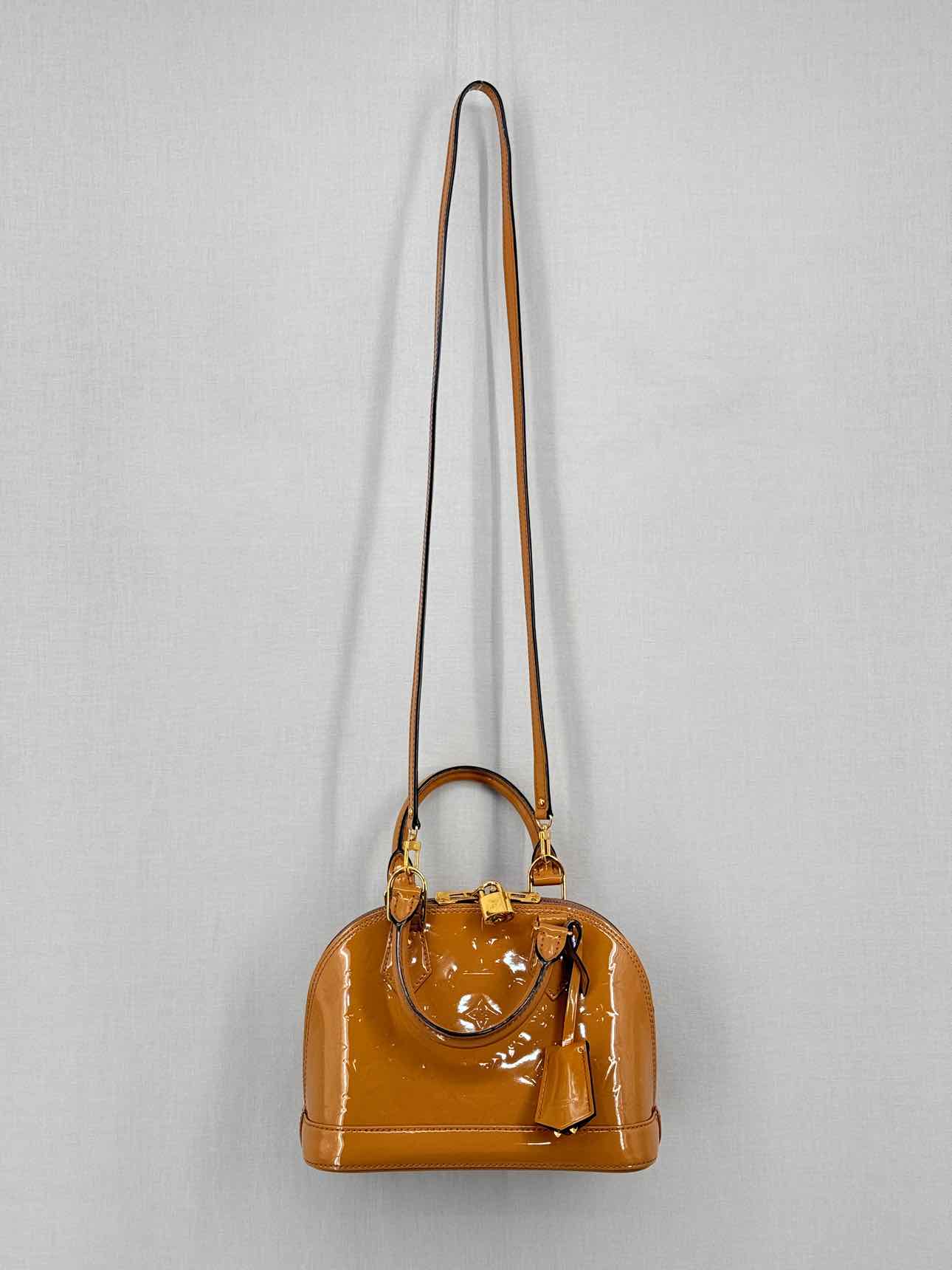 LOUIS VUITTON Alma Tan Monogram Top Handle
