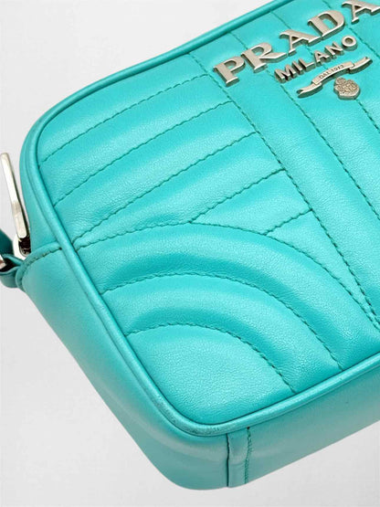 PRADA Diagramme Camera Turquoise Quilted Crossbody