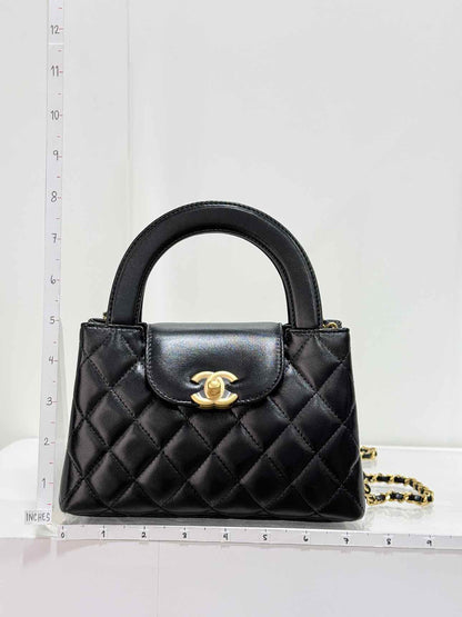 CHANEL Kelly Black Quilted Top Handle