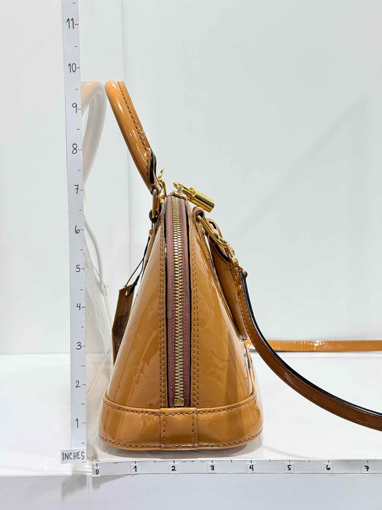 LOUIS VUITTON Alma Tan Monogram Top Handle