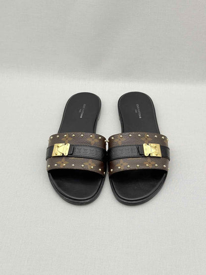 LOUIS VUITTON LOCK IT Brown & Black Size EU 37.5 Slides