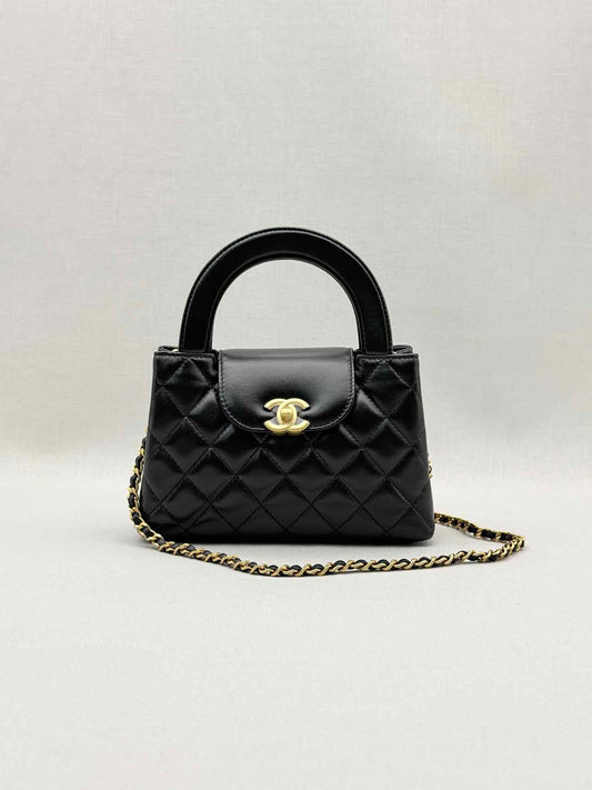 CHANEL Kelly Black Quilted Top Handle