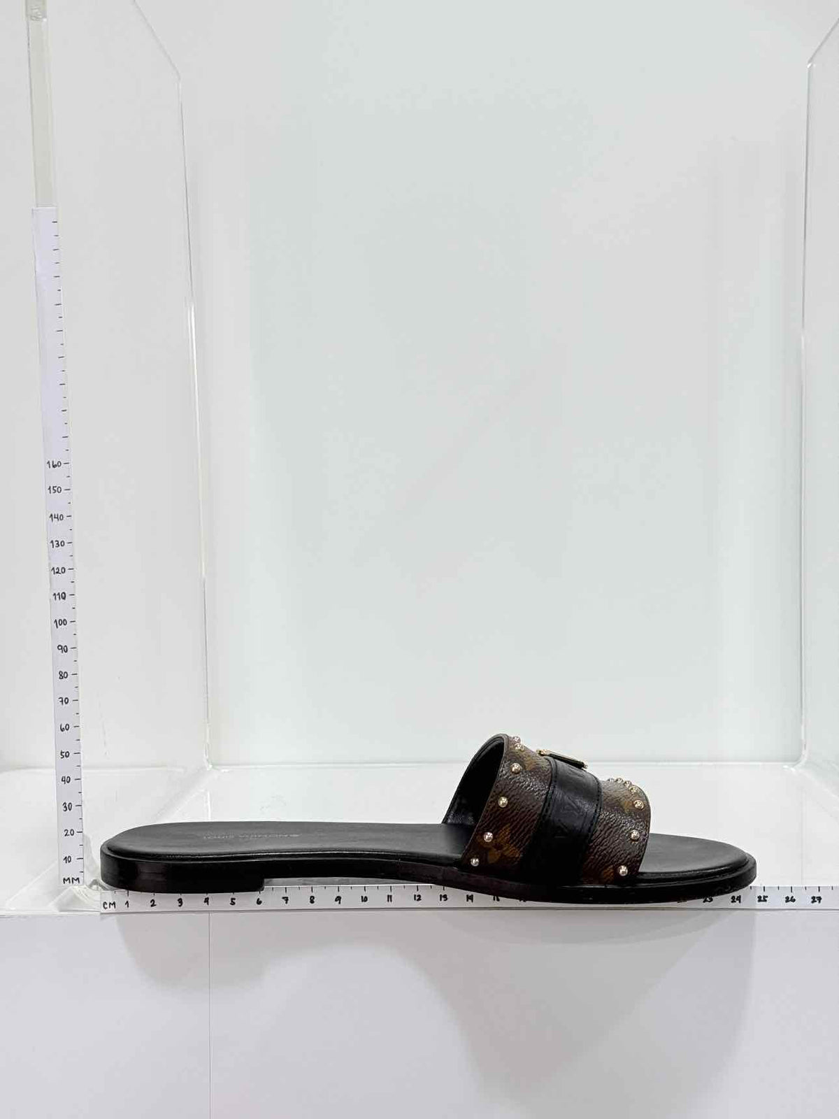 LOUIS VUITTON LOCK IT Brown & Black Size EU 37.5 Slides