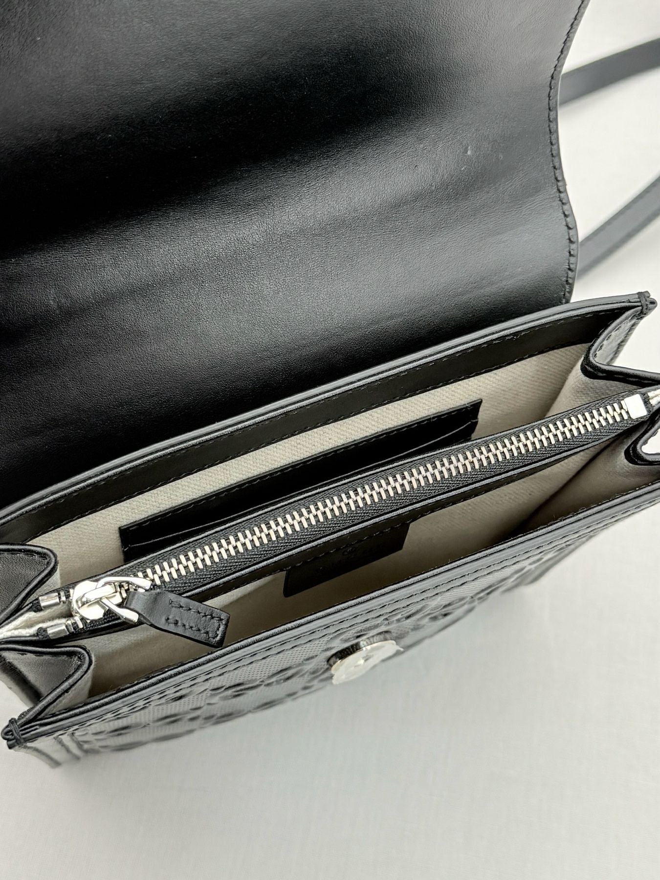GUCCI Black GG Embossed Crossbody