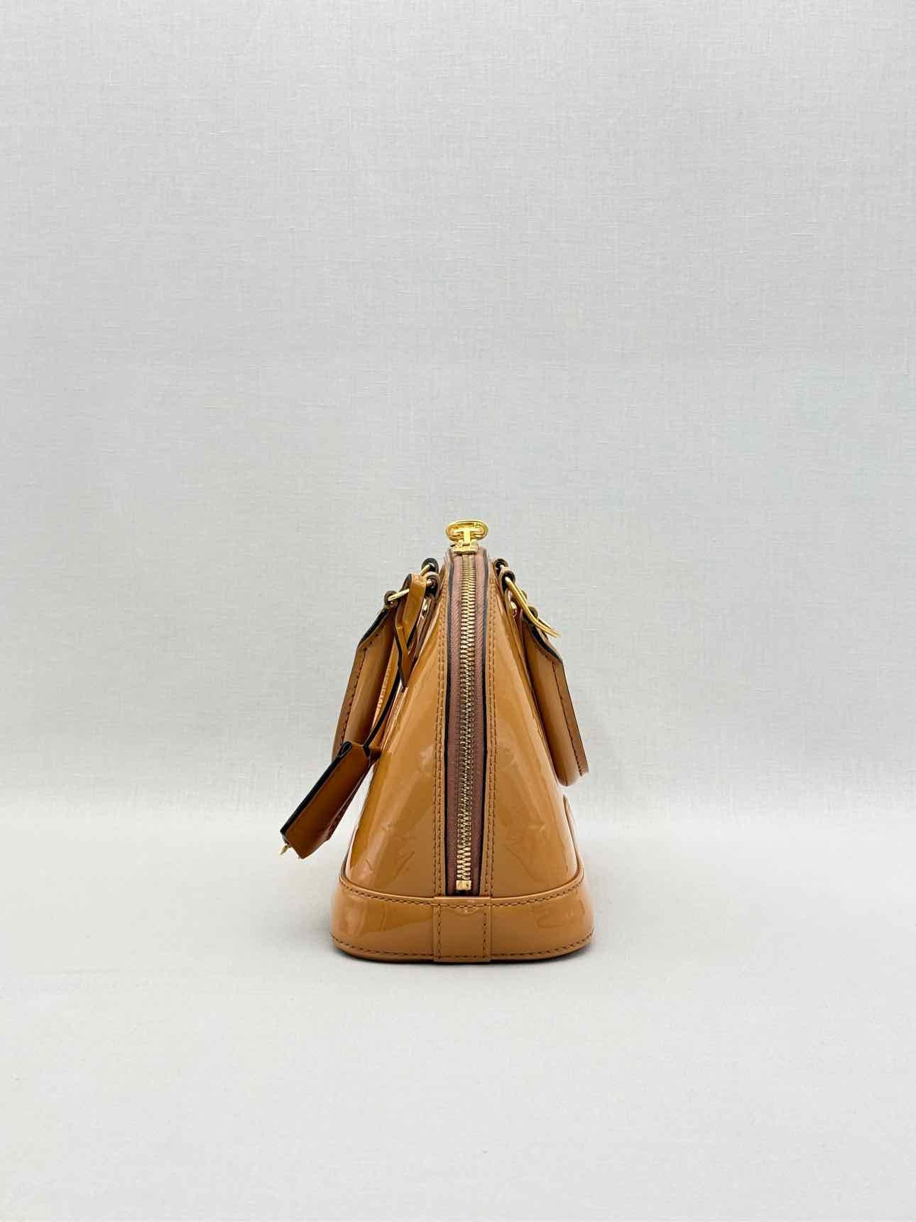 LOUIS VUITTON Alma Tan Monogram Top Handle
