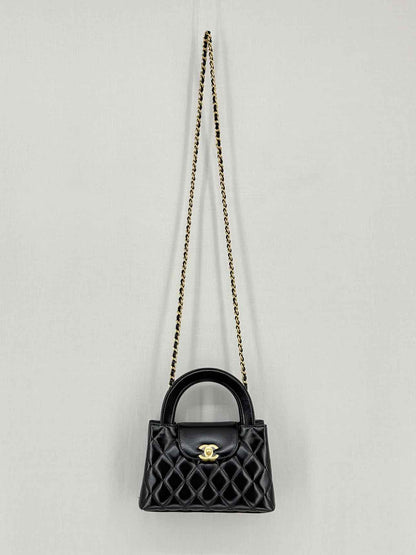 CHANEL Kelly Black Quilted Top Handle