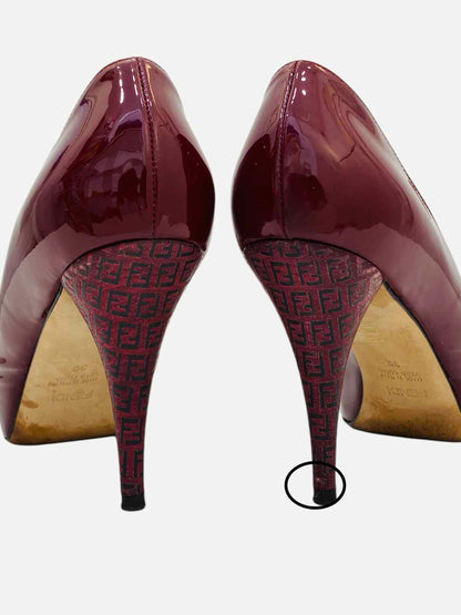 Pre - loved FENDI Ruby Red FF Motif Pumps at Reems Closet