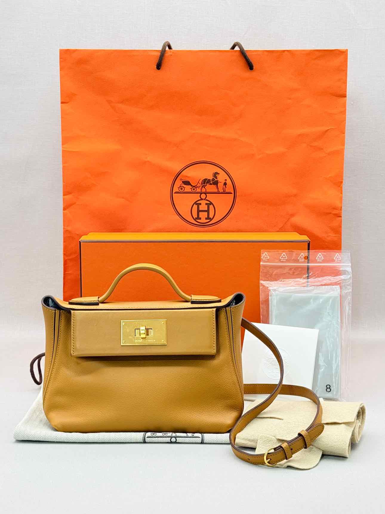 HERMES 24/24 Gold Top Handle