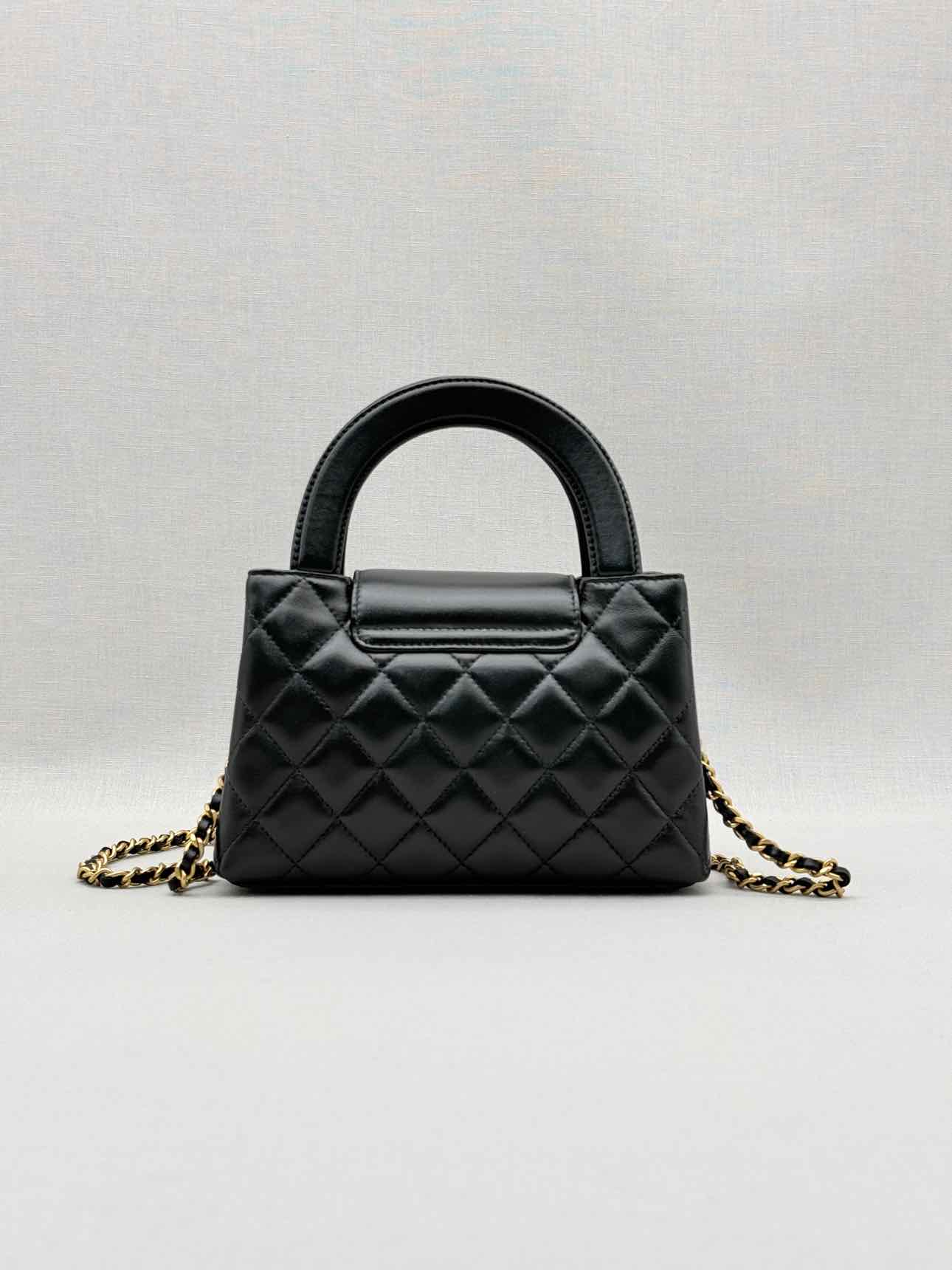 CHANEL Kelly Black Quilted Top Handle