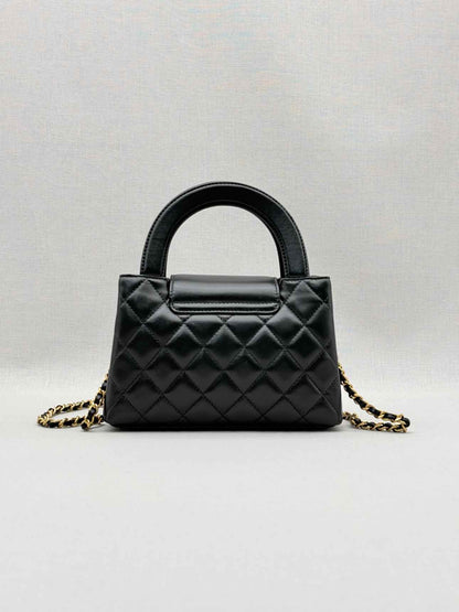 CHANEL Kelly Black Quilted Top Handle
