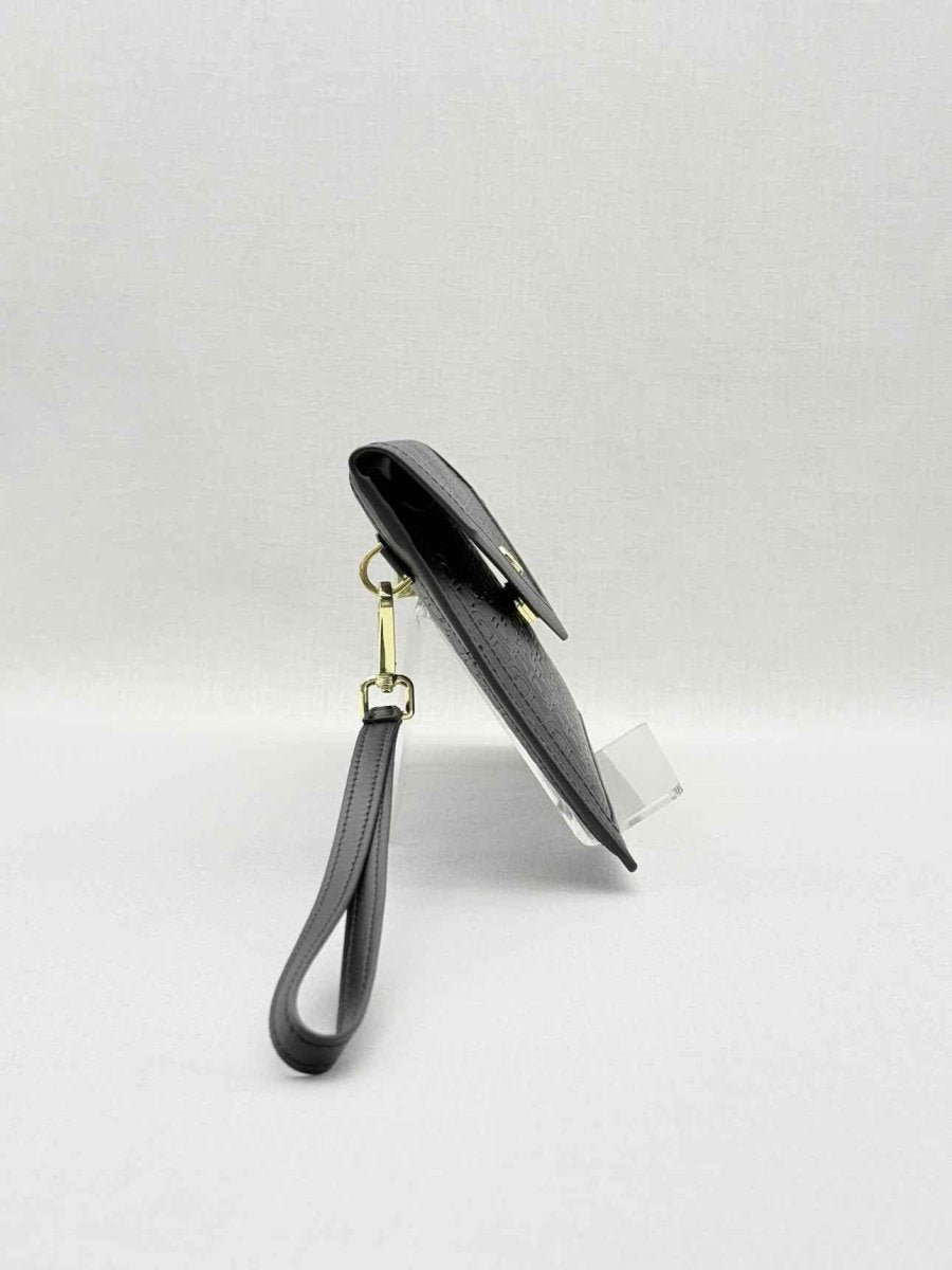 Pre - loved AIGNER Envelope Black Wristlet at Reems Closet