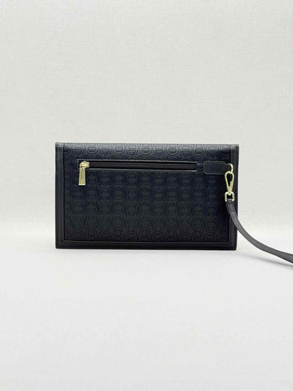 Pre - loved AIGNER Envelope Black Wristlet at Reems Closet